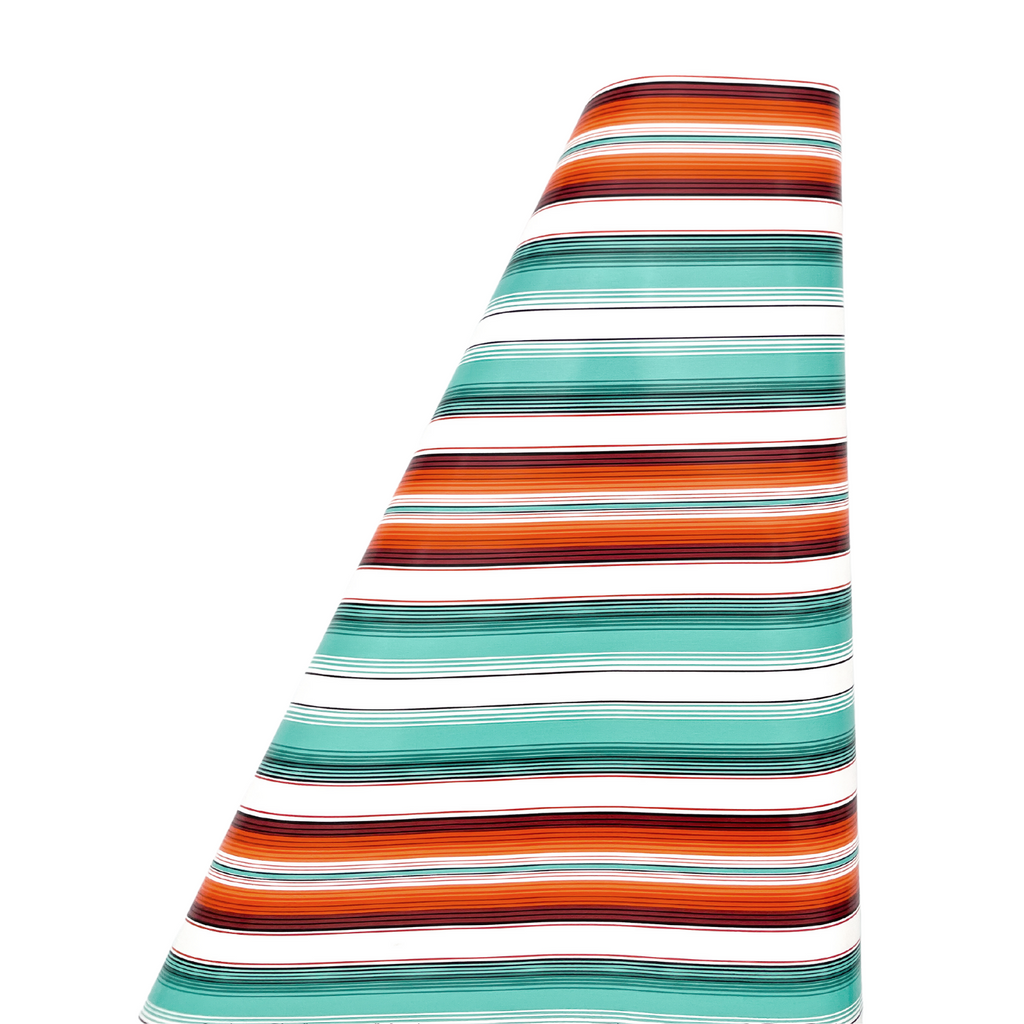 Heavyweight gift wrap paper with "Desert Stripe" turquoise, orange and creme colored stripes on a roll.
