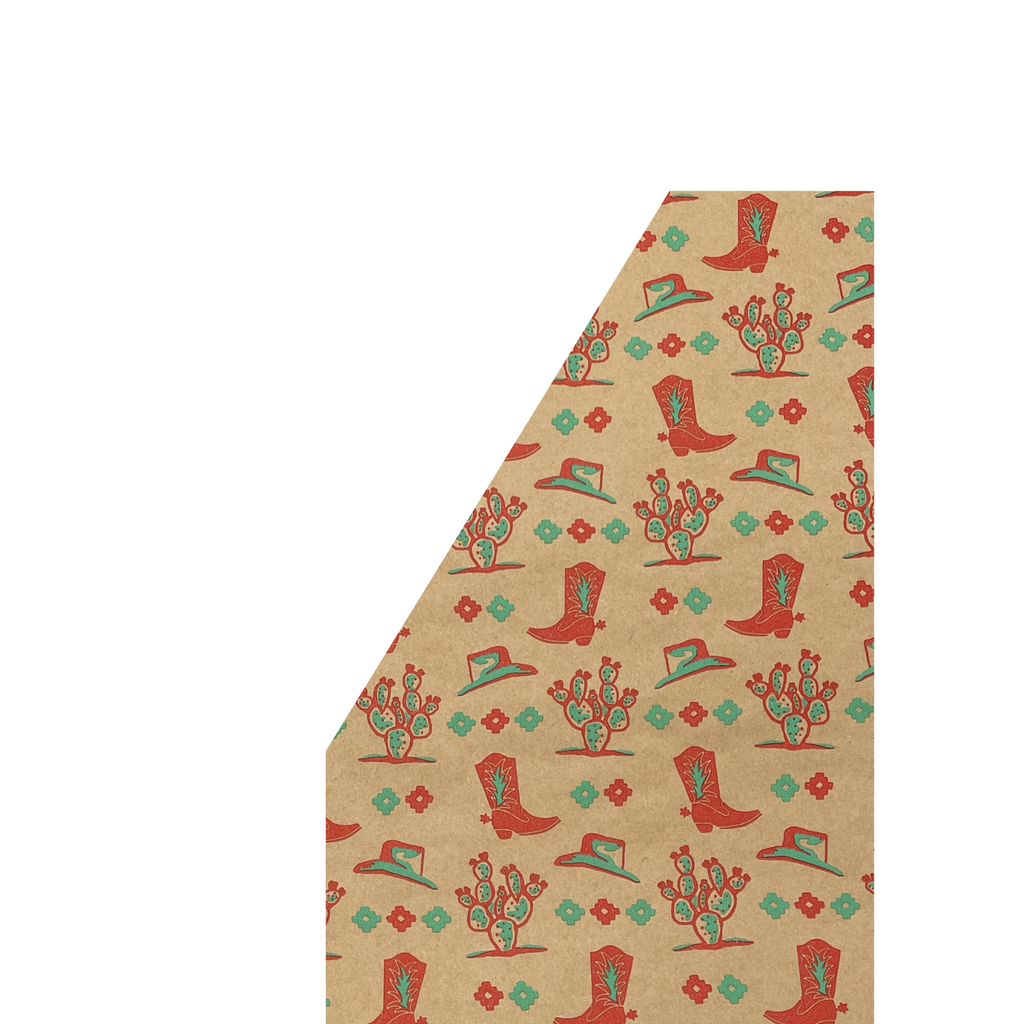Brown kraft paper gift wrap roll with a red and turquoise concho, cowboy hat, cowboy boot, and cactus print. 