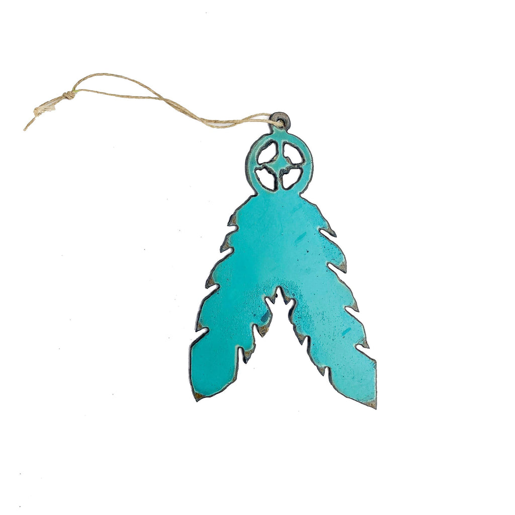 Turquoise feather shaped iron ornament. Brown string attached for hanging.