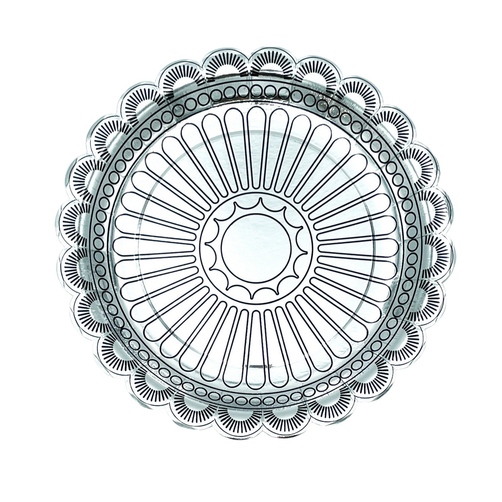 Round silver concho shaped dinner plate.