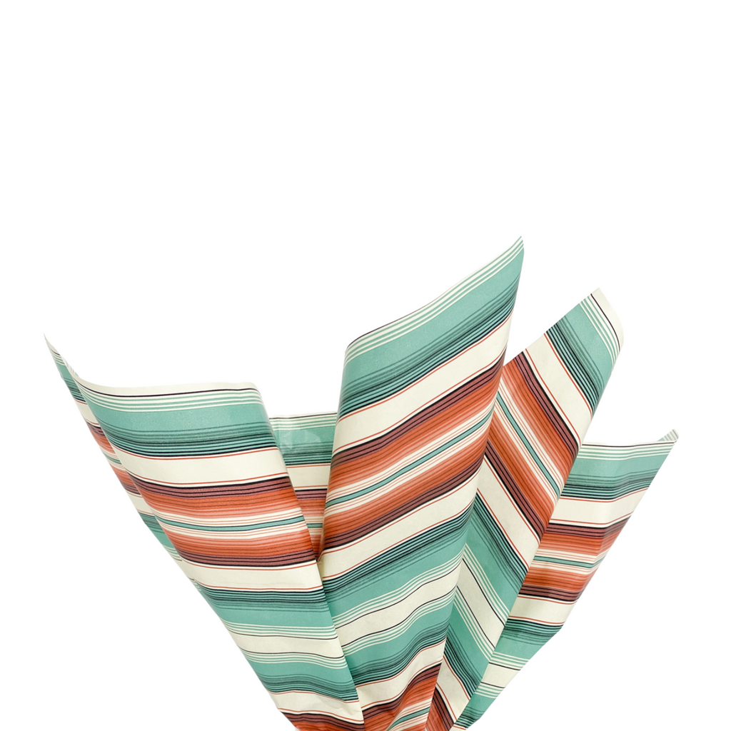 Tissue paper with "Desert Stripe" turquoise, orange and creme colored stripes. 