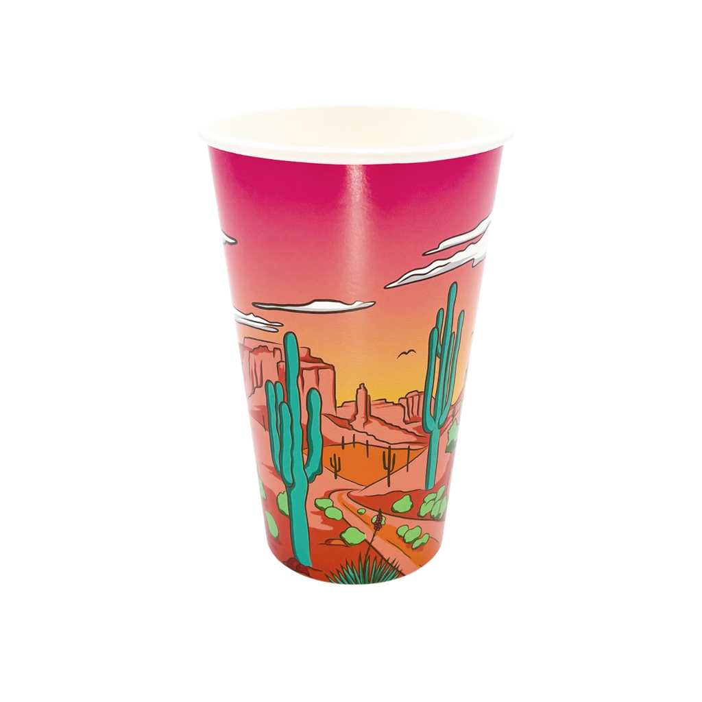 Pink paper cups with our "Party West" desert scene print. Green cactus and light pink mountain scene with white clouds. 
