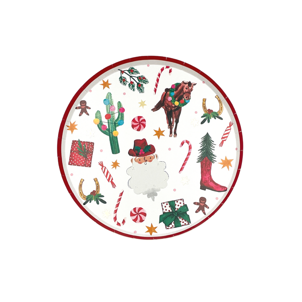 Round paper dessert plate with red border on top. Christmas pattern featuring the following hand-drawn motifs: Santa with a red cowboy hat, candy cane and mint candies, saguaro cacti with Christmas string lights, horses with wreaths around their necks, wrapped presents, holly branches,, horse shoes with holly, and orange and gold foil 6-point stars.