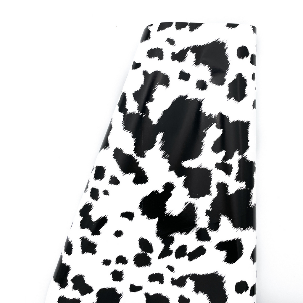 black and white cowhide print on heavyweight gift wrapping paper on a roll