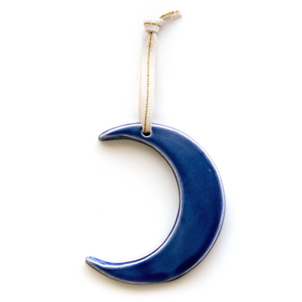 Dark blue ceramic crescent moon ornament with cream canvas ribbon tie with brown stripe