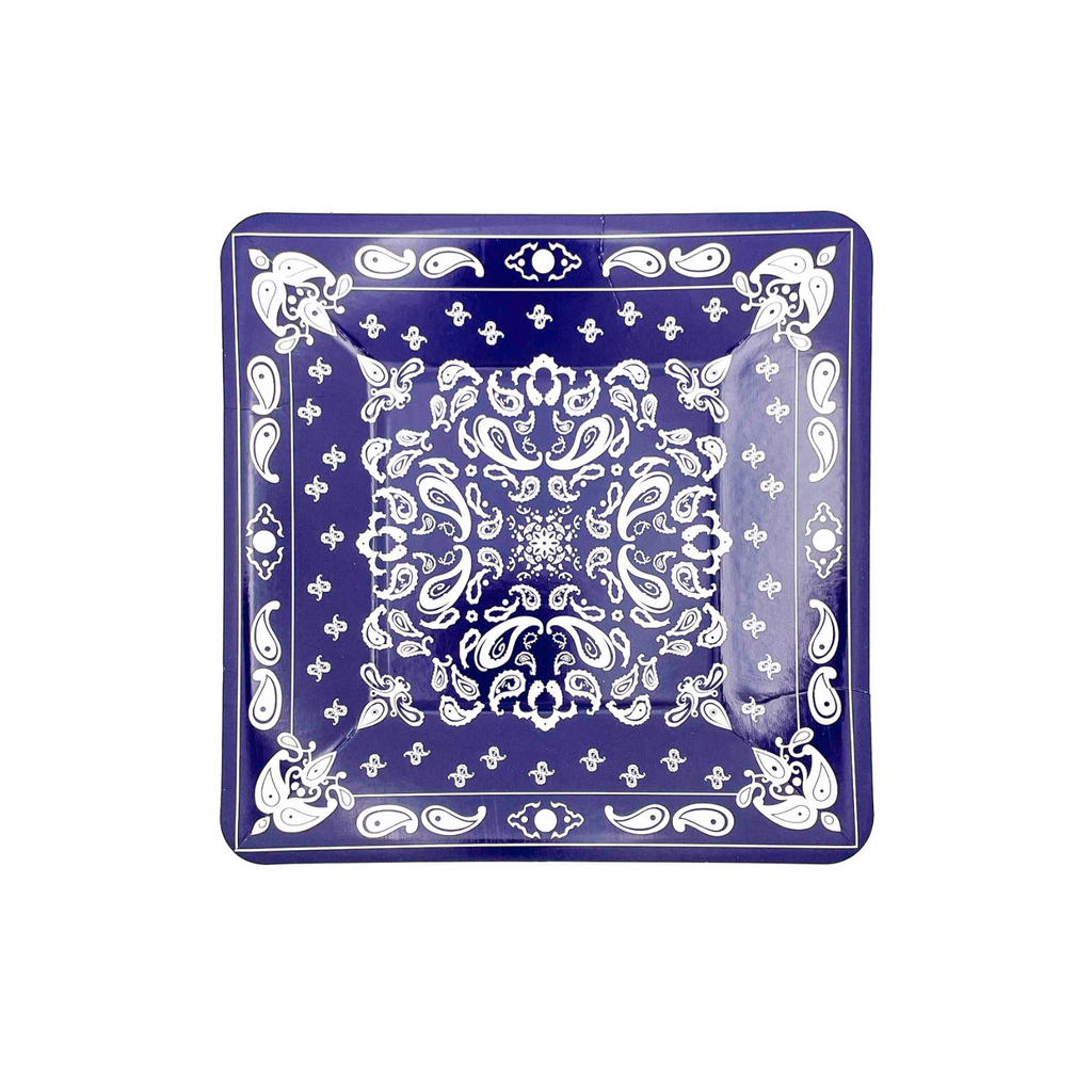 Navy blue colored square paper dessert plates with white bandana paisley print details.