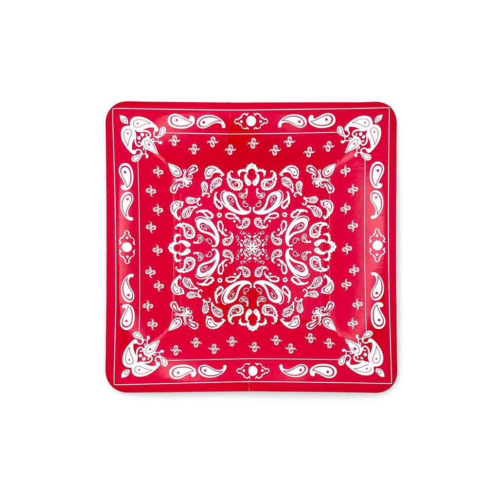 Red colored square paper dessert plates with white bandana paisley print details.