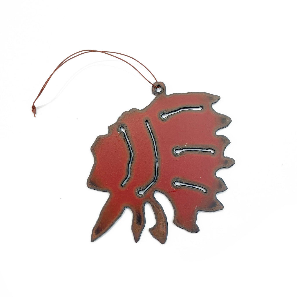 Red iron Indian headdress ornament with a small string attached to hang on a Christmas tree.