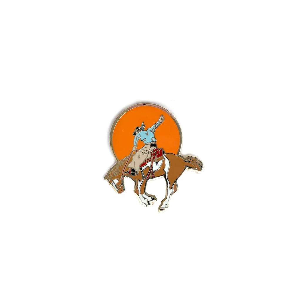 sunset cowboy on a bucking horse pin 